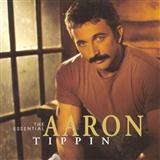 Download or print Aaron Tippin I Wonder How Far It Is Over You Sheet Music Printable PDF 5-page score for Country / arranged Piano, Vocal & Guitar Chords SKU: 123692