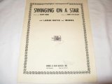 Download or print Johnny Burke Swinging On A Star Sheet Music Printable PDF 4-page score for Easy Listening / arranged Piano, Vocal & Guitar Chords SKU: 40375