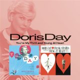 Download or print Doris Day Hold Me In Your Arms Sheet Music Printable PDF 3-page score for Standards / arranged Piano, Vocal & Guitar Chords SKU: 42591