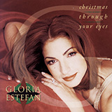 Download or print Gloria Estefan Christmas Through Your Eyes Sheet Music Printable PDF 4-page score for Latin / arranged Piano, Vocal & Guitar Chords (Right-Hand Melody) SKU: 473549